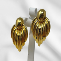 Gold Dangling Ribbed Clip-On Earrings